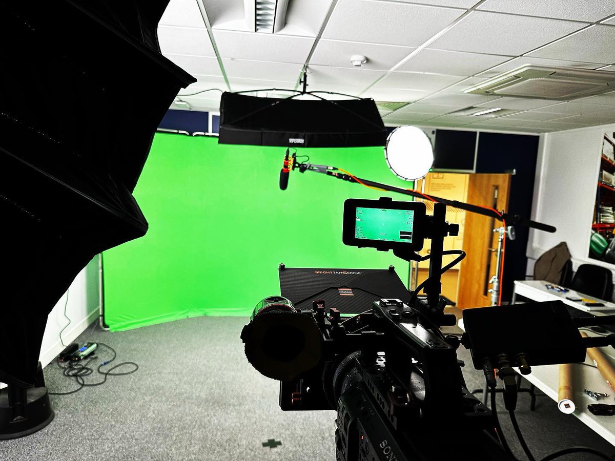One of our mobile green screen kits out on location shooting some content for interactive digital signage.  Several of these backdrop kits can be joined together to create an ultra wide panoramic backdrop to fill any space,  they also come with special green flooring that can be