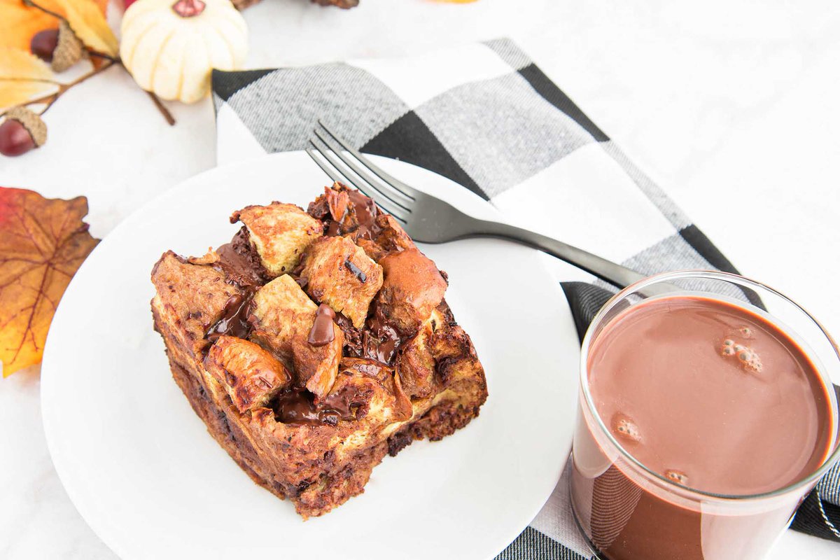 Slow Cooker Chocolate Milk French Toast Recipe *** Love chocolate milk? Love french toast? Then you'll love cozying up with a slice of this simple slow cooker breakfast casserole just as much as we do! foodie.cm/slowcooker/?sr…