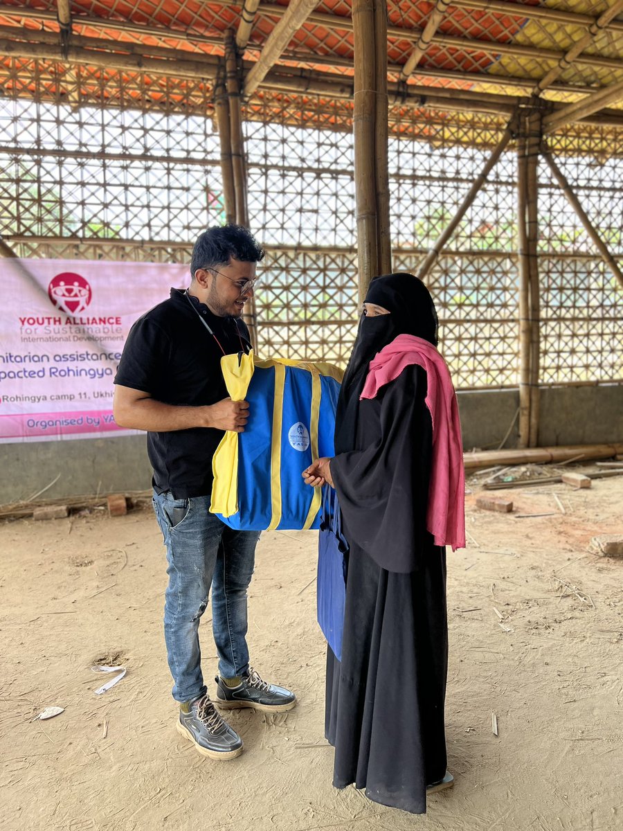 HamidKysar's tweet photo. Today , I and my #YASID team went #Rohingya camp and distributed cloths to the families who were affected by the recent fire broke out . Especially women can’t get access to many facilities due to lack outdoor wearing dress as they lost during the incident. https://t.co/zIJ0KfxEUp
