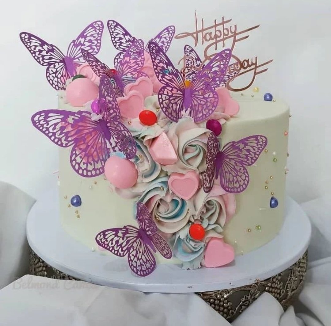 BelmondCakes's tweet photo. Fluttering with flavor and beauty, this butterfly themed cake is a true work of art🦋🍰 https://t.co/oRD8NzqpNv