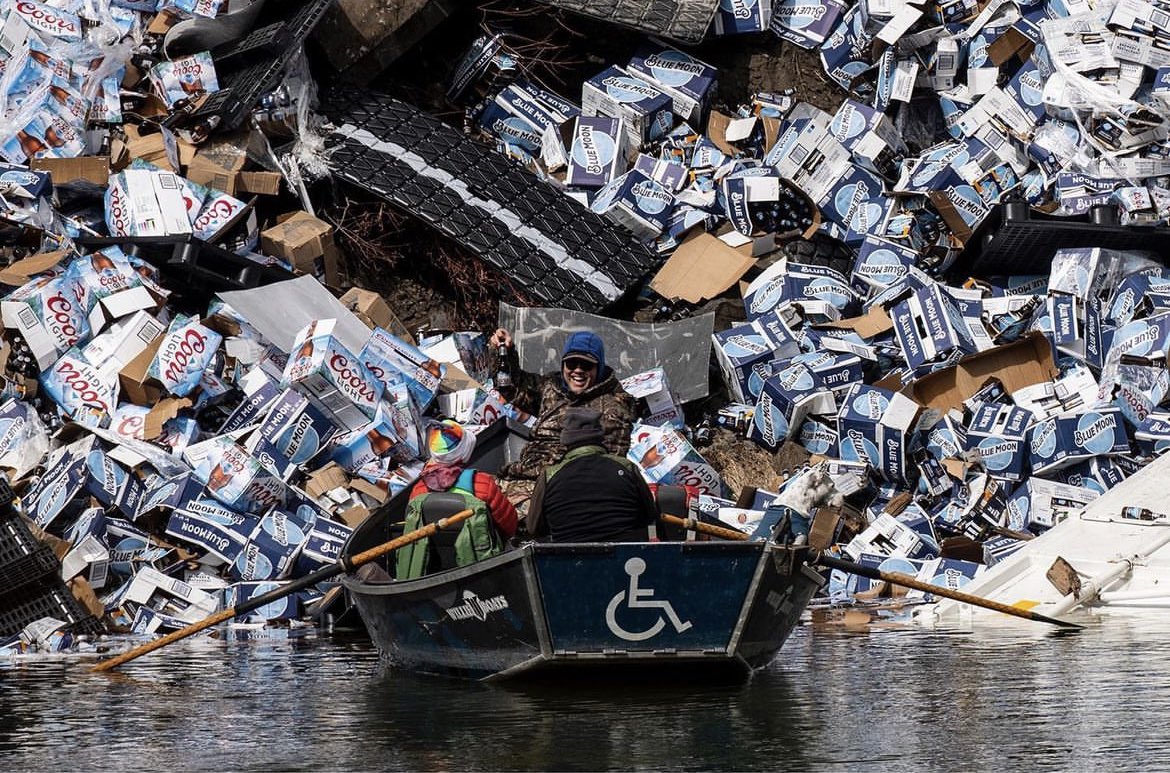 David__Erickson's tweet image. The train that derailed today on the Clark Fork River spilled hundreds of cases of beer and the Missoulian’s Ben Smith got this legendary photo