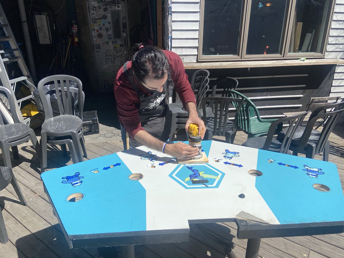wondervillenyc's tweet photo. It’s a beautiful day so we are embiggening the cupholders in Killer Queen and installing threaded inserts for the joysticks! #arcademaintenance https://t.co/Ej41zxIgsY