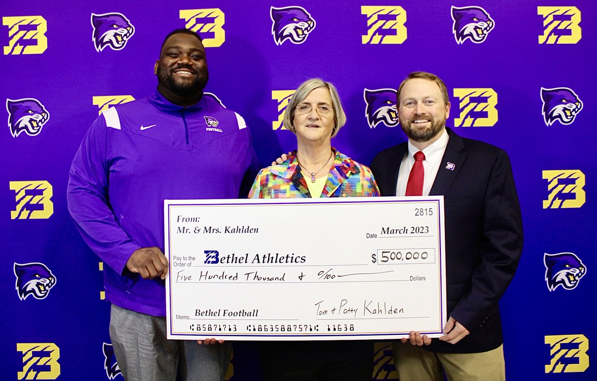 BUWildcats's tweet photo. Bethel Board of Trustee member Patty Kahlden,  a longtime supporter of the university and the Bethel Athletic department presented Football Coach Michael Jasper and Senior Athletic Director Brad Chappell a generous gift for the football program. 
More @www.bethelathletics.com https://t.co/fYSDwyclbZ