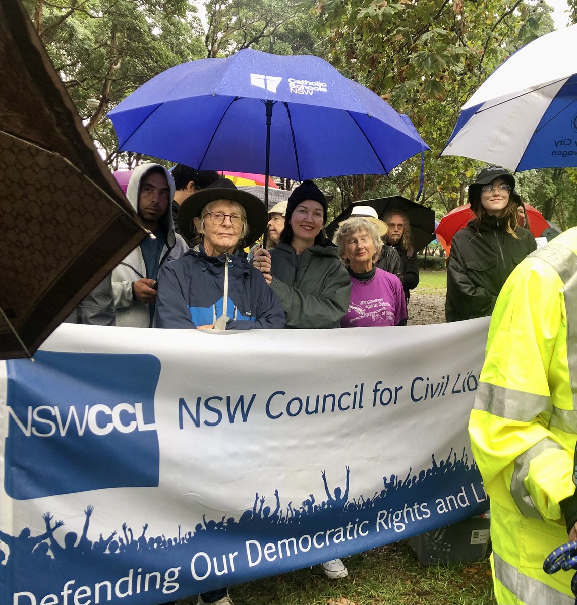 NSWCCL's tweet photo. Fab contingent of @NSWCCL members at the Sydney #PalmSunday2023 rally yesterday. A little rain ☔️ didn’t deter our calls for permanent protection for all refugees & humanity & heart ❤️ in Australian refugee policy. #endoffshoreprocessing #endmandatorydetention https://t.co/ZYN5RR3anY