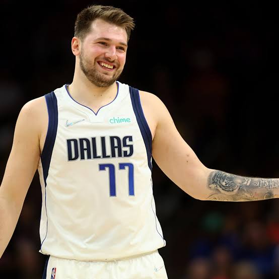 RobBuchananNBA's tweet photo. REPORT: Kyrie Irving and Luka Doncic had to be separated after being involved in a verbal altercation after the team's crucial loss against the Atlanta Hawks.

(via @ESPNNBA and @BallsackSports) https://t.co/lMWoch7I5f