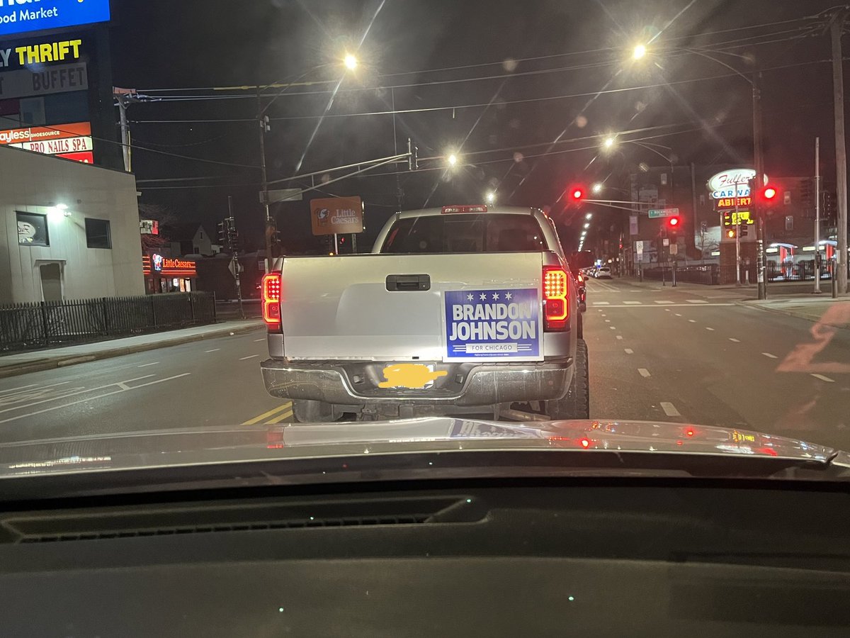 This truck is decked out in Brandon Johnson signs. This isn’t one of the fancy LED billboard truck that Paul Vallas  has - this is working class love. #BrandonIsBetter