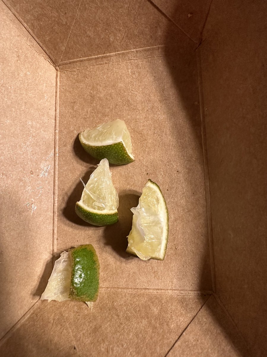 JBehmke's tweet photo. Damn!  I guess I should have not only checked my order but I should have looked at the food. The damn limes on the street tacos are dried out. How is this acceptable @tacojohns ? https://t.co/joh6P4ciFa