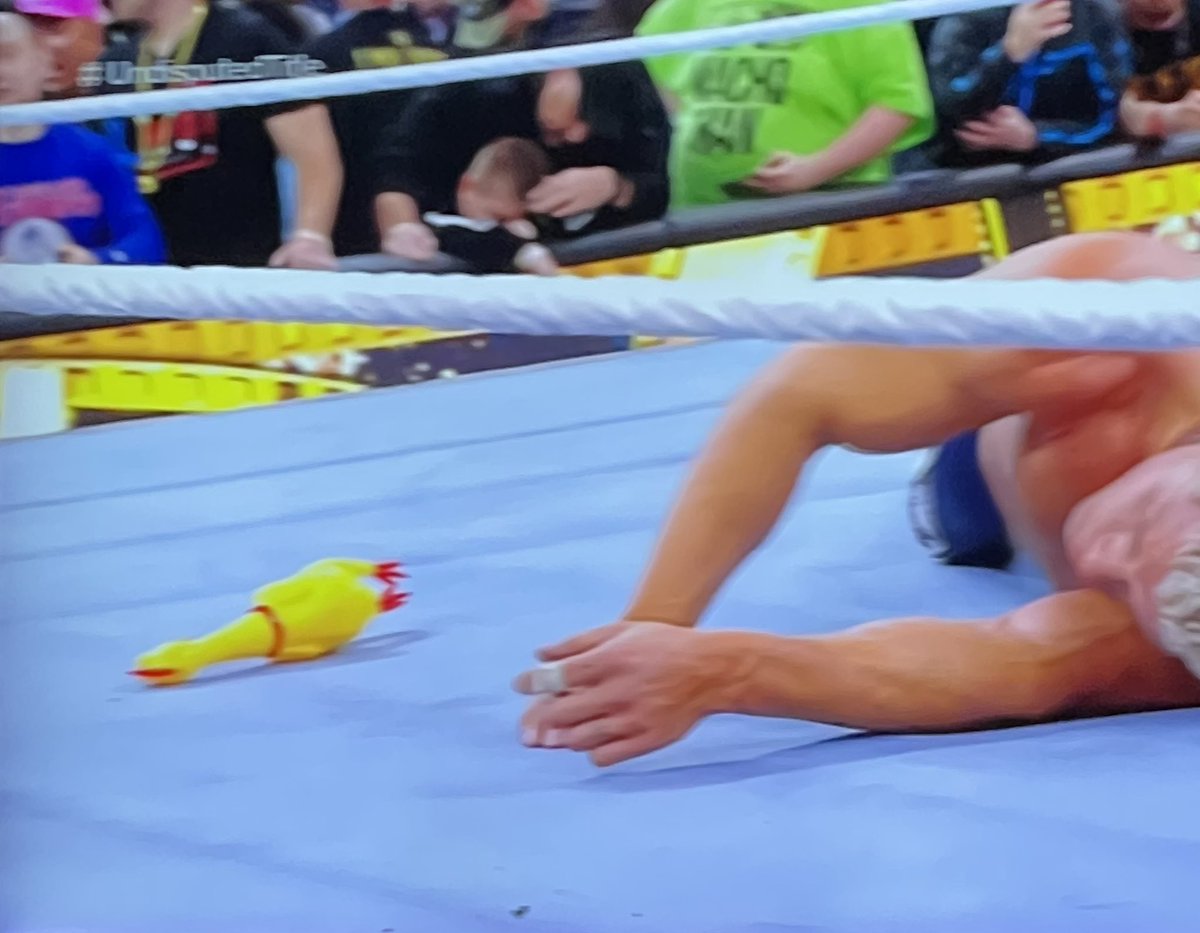 ryfallon's tweet image. Who brought the chicken to the ring? #WrestleMania