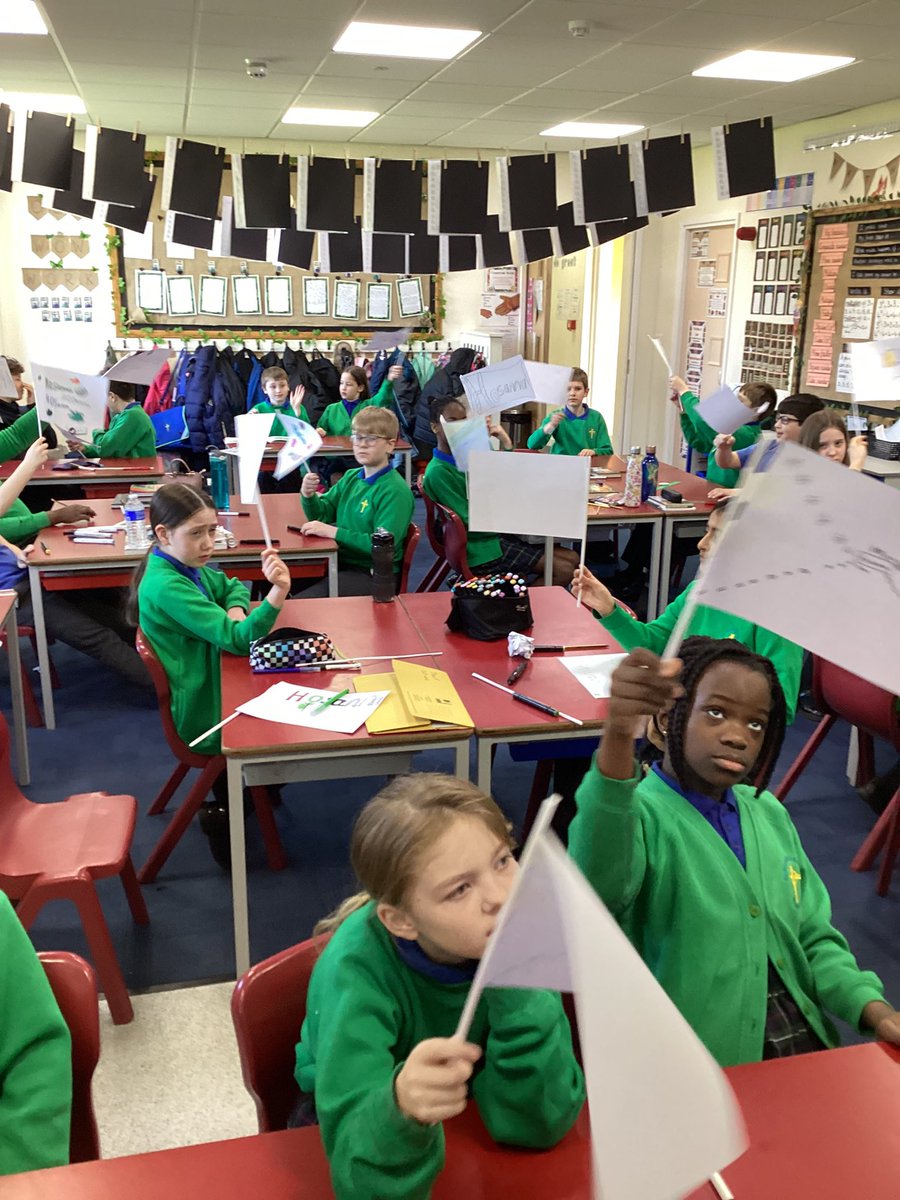 MissIannaccone's tweet photo. Today is the start of Holy Week- we replicated the triumphant entry into Jerusalem by Jesus; we took on the role of the crowds and waved our flags as we shouted HOSANNA 🙏🏼@stpatsrochdale @STOC_CAT https://t.co/ZggxnMjwhD