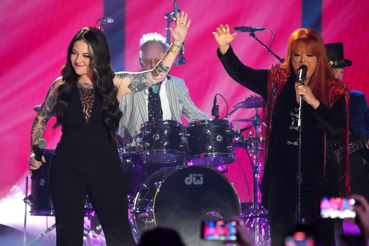 AshleyMcBryde's tweet photo. “It looks like love has finally found me “
Wy, standing in awe of you is even better when I’m by your side on a stage. @Wynonna 
Thank you CMT awards for such a cool night in Austin. And for giving me this moment. #CMTawards https://t.co/XgD114R576