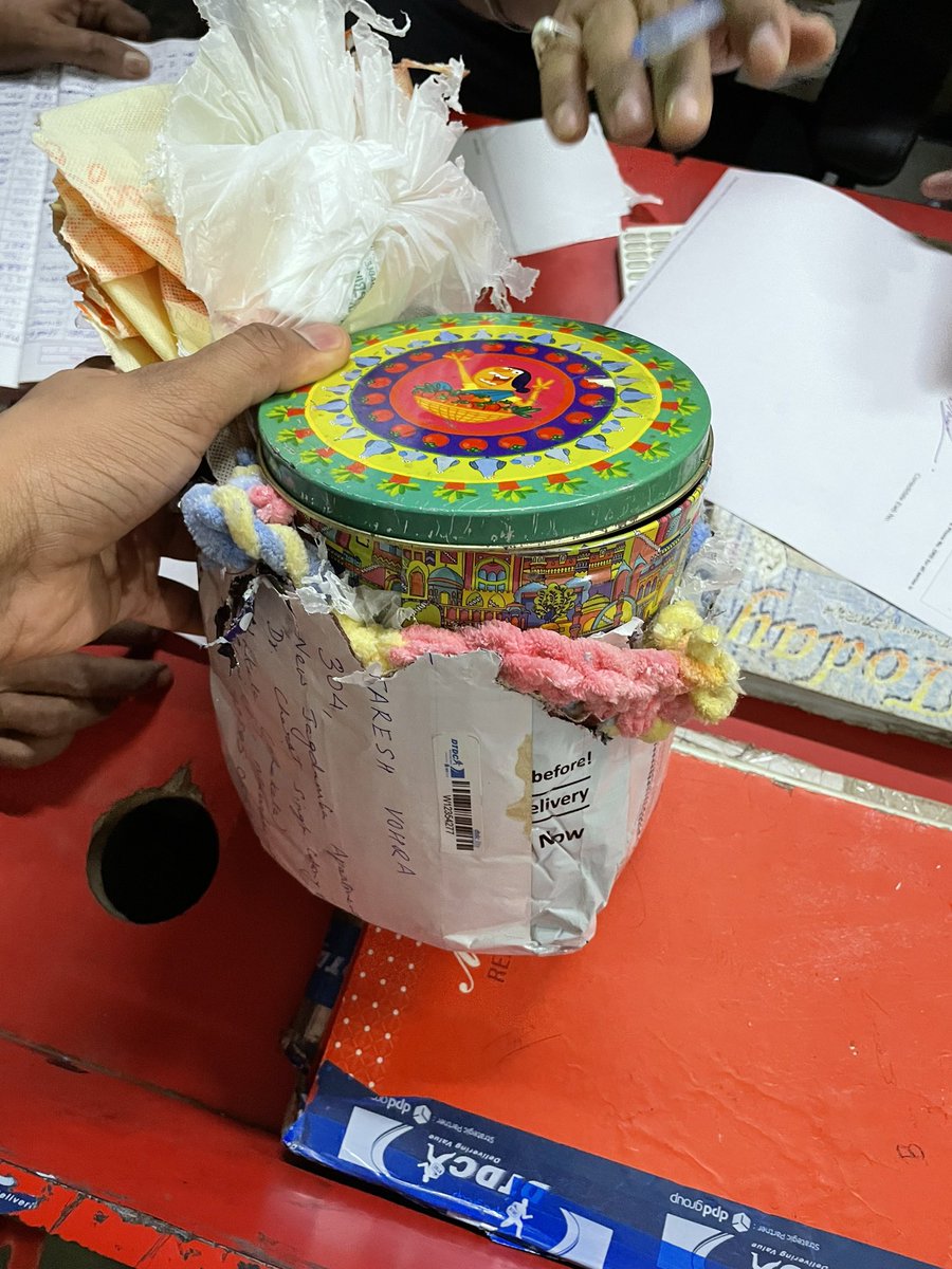 entertaresh's tweet photo. @DTDCIndia this is infuriating. My mother sent sweets for Ram Navami along with a lovely woollen knit cap and the sweets have been eaten and cap torn. I had to pick it up from the warehouse where I could get no answers about who or what has done this. https://t.co/uDqNboDDXc