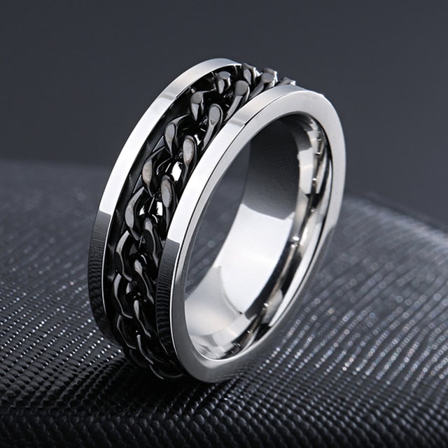 Get ready to spin your style game to the next level with our sleek and stylish black and silver spinner ring. Featuring a unique two-tone finish and a spinning inner band, this ring is perfect for fidgeters and fashionistas alike. 
#mensrings #spinnering #mensjewellery