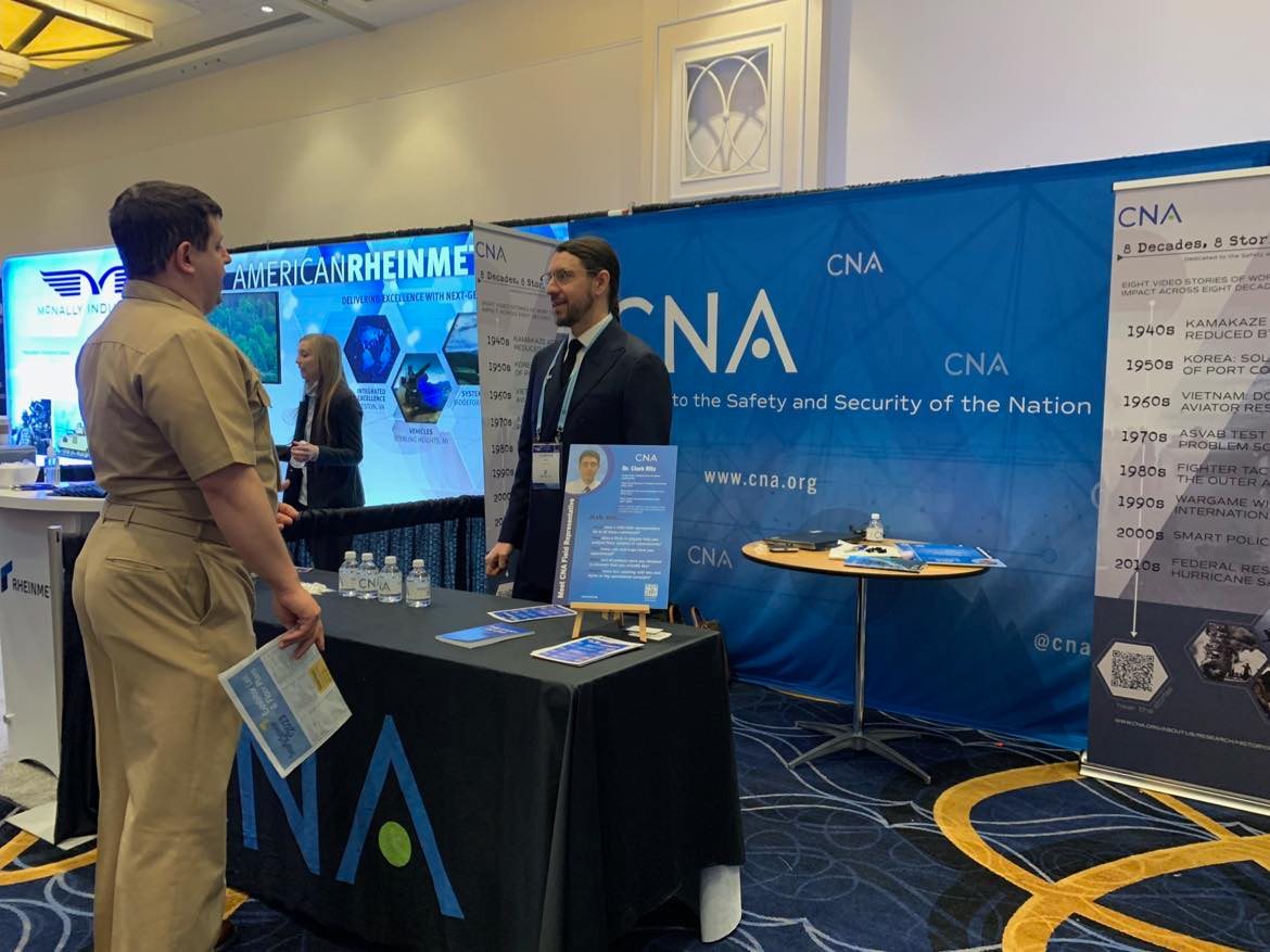 CNA_org's tweet photo. Some of CNA’s amazing field representatives like @CLARKRITZ (below) are at @SeaAirSpace.  Stop by and learn about how our analysts support commands around the world.  #SeaAirSpace https://t.co/CTk1VIkzIu