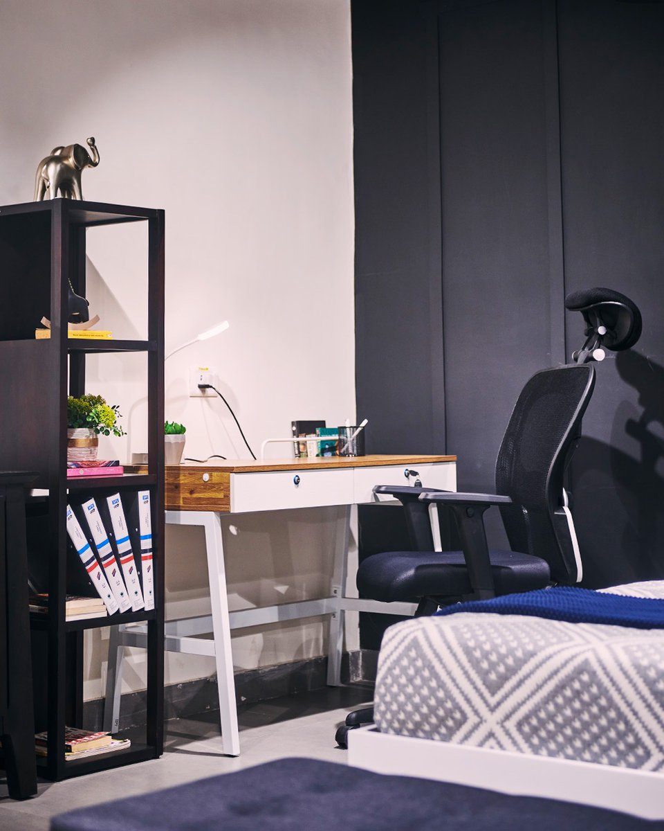 Oh so sleek and functional! This study setup may just be what you need to not work from your bed 🤭

Featured here is our Terry Study Table, Edmund Study Chair, and Yakove Bookshelf 

#urbanladder #studyroom #studyroomdesign #moderndesign