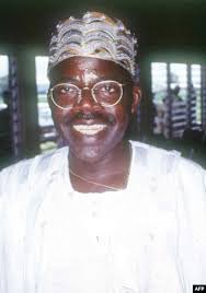 MikaelCBernard's tweet photo. Merely looking at Tinubu, it’s obvious he’s not a Yoruba man. There’s nothing Yoruba in that face. It’s pretty obvious.

His direct father is Fulani, the Tinubu family he uses their name, is Kanuri. His passport is Guinea. 

There’s nothing Yoruba about Tinubu, this man just bought up the elite of an entire tribe, and installed himself as their leader.

Same thing he did in Guinea, Gambia and God knows where.

This is why Afenifere rejected him with all their might, as they knew he is an impostor. 

Just look at this face and tell me if this is the looks of a Yoruba man.