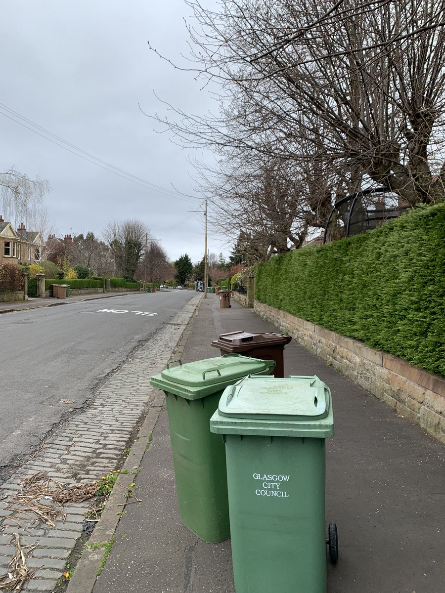 llovelock's tweet photo. Come on @GlasgowCC the least we can expect is the bins to not be left in the middle of pavements causing an obstruction after being emptied. It was an Assault course walk this morning 🙄 https://t.co/JfEYeoicq4