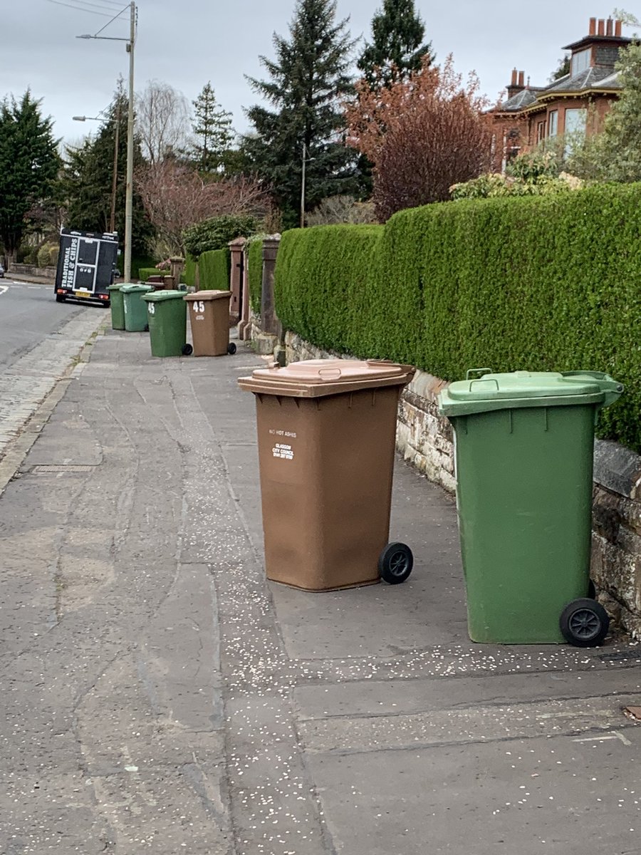 llovelock's tweet photo. Come on @GlasgowCC the least we can expect is the bins to not be left in the middle of pavements causing an obstruction after being emptied. It was an Assault course walk this morning 🙄 https://t.co/JfEYeoicq4