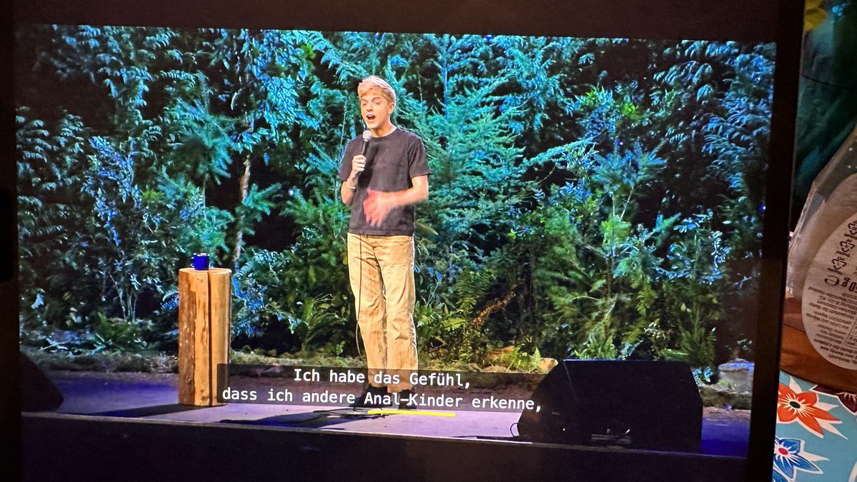 so, we're enjoying the new @TheMaeMartin standup but we're not entirely sure about the German subtitles' translation of 'doggy-style baby'