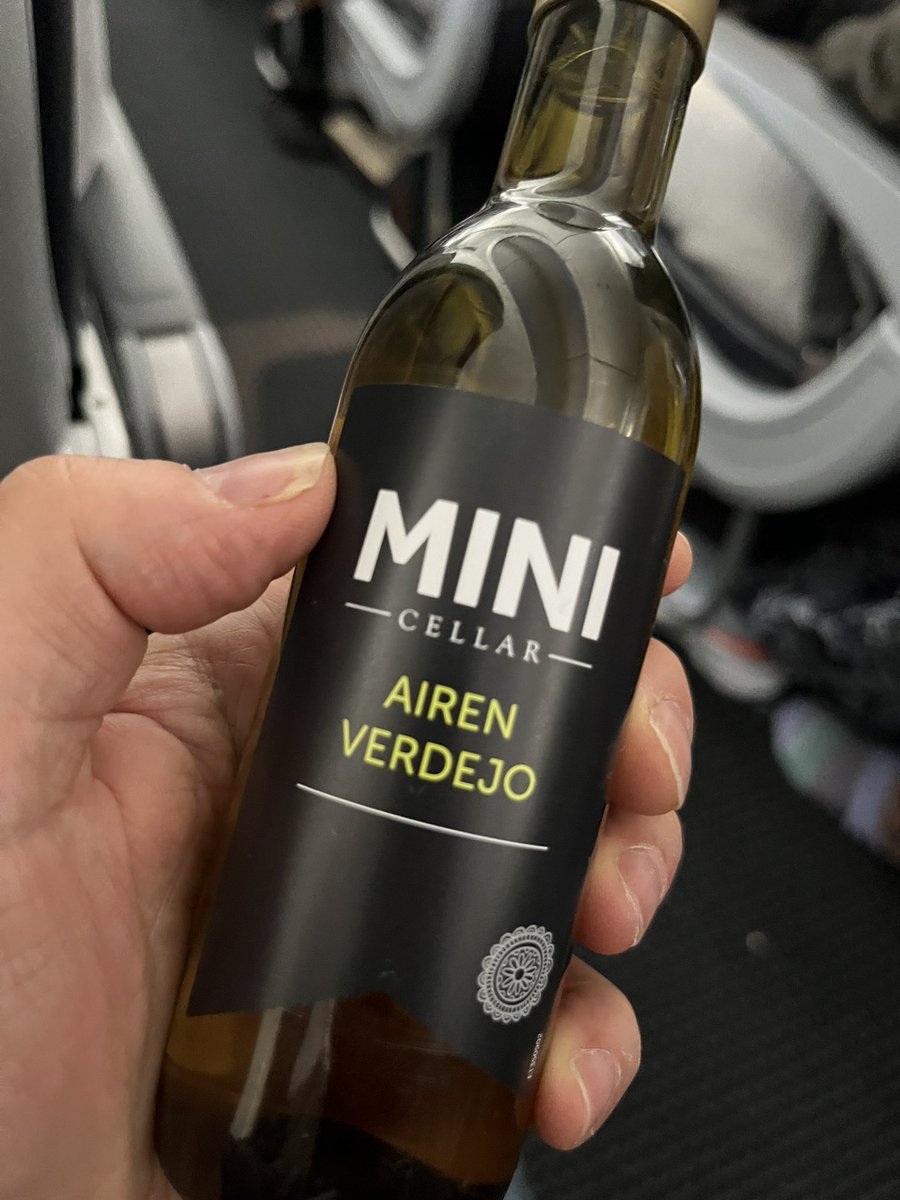 JayKrasnow's tweet photo. 3 cheers 4 Matthew the @AmericanAir flight attendant for picking out this fine #wine to put in #babyyoda ‘s soup. That should hold him until we make our connection to our flight to Colorado Springs. https://t.co/Rjl6Wn8lhm