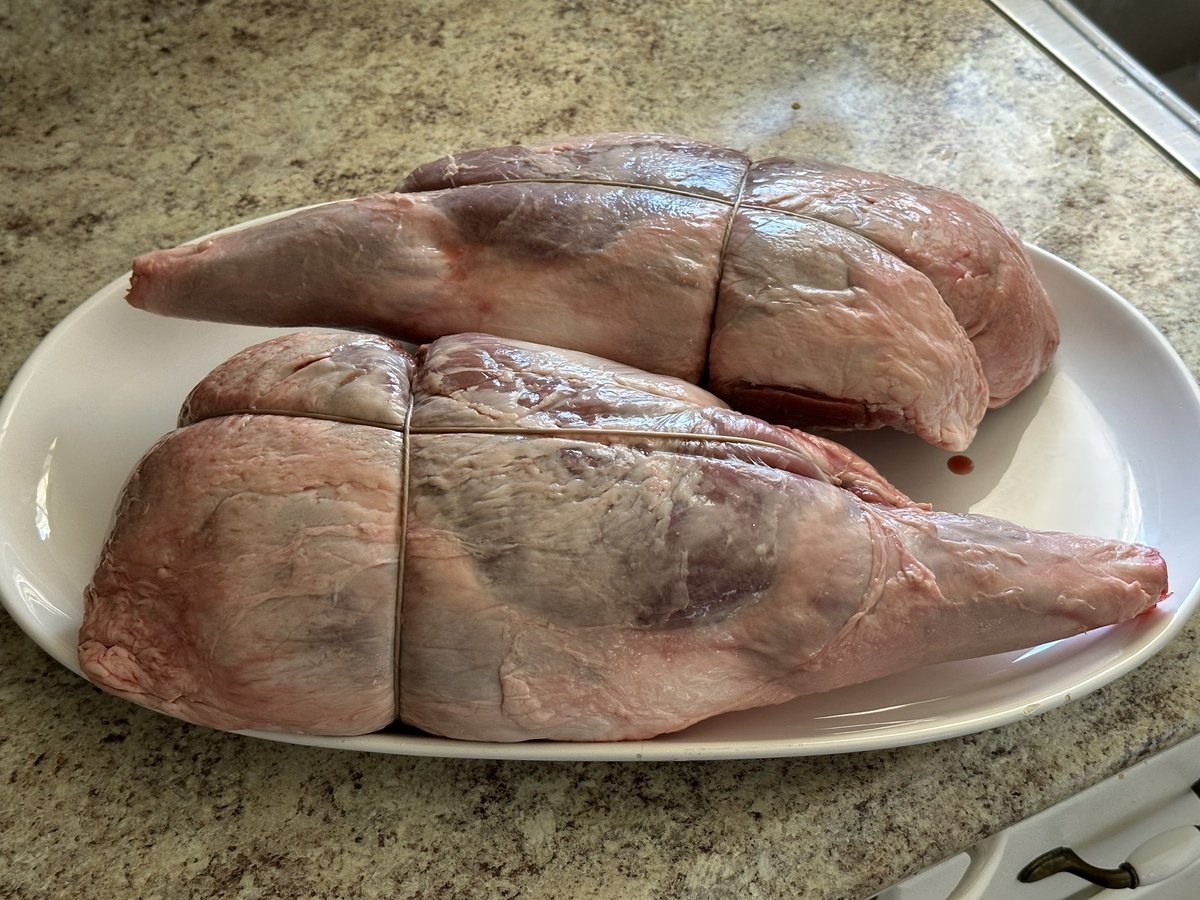 Square1Wellness's tweet photo. Having some family over for a delayed Easter celebration! Putting these 2 legs on the #biggreenegg #yes2meat #OrthodoxEaster #greekdinner #legoflamb #healthcoach @SQ1Wellness #chefrobert https://t.co/0UDZy7sOyI