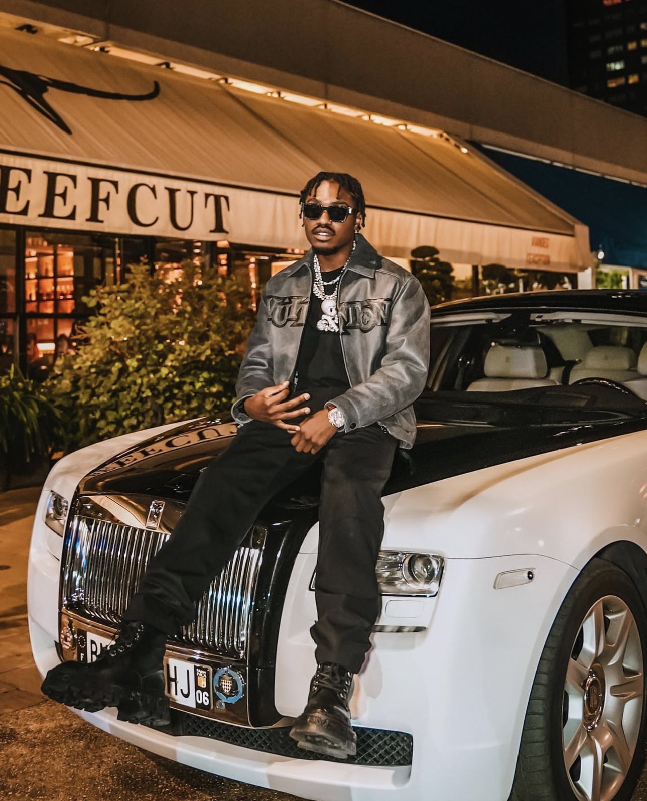 Popcaan Stunts In Rolls-Royce And Icy Jewelry In “Money Speaks