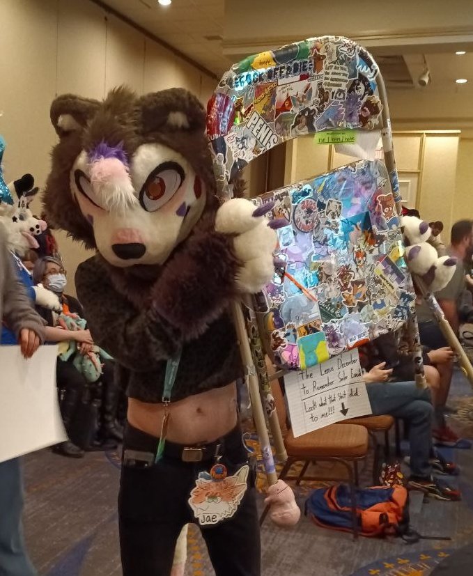 noijom's tweet photo. northern new england catboy/sergal leaves Portland furry con with dilapidated chair (i heard @KovuTheHusky sat on it 😳😳😳) what will he do??? #Furcationland #FCL2023 https://t.co/rFtfJOUcLm
