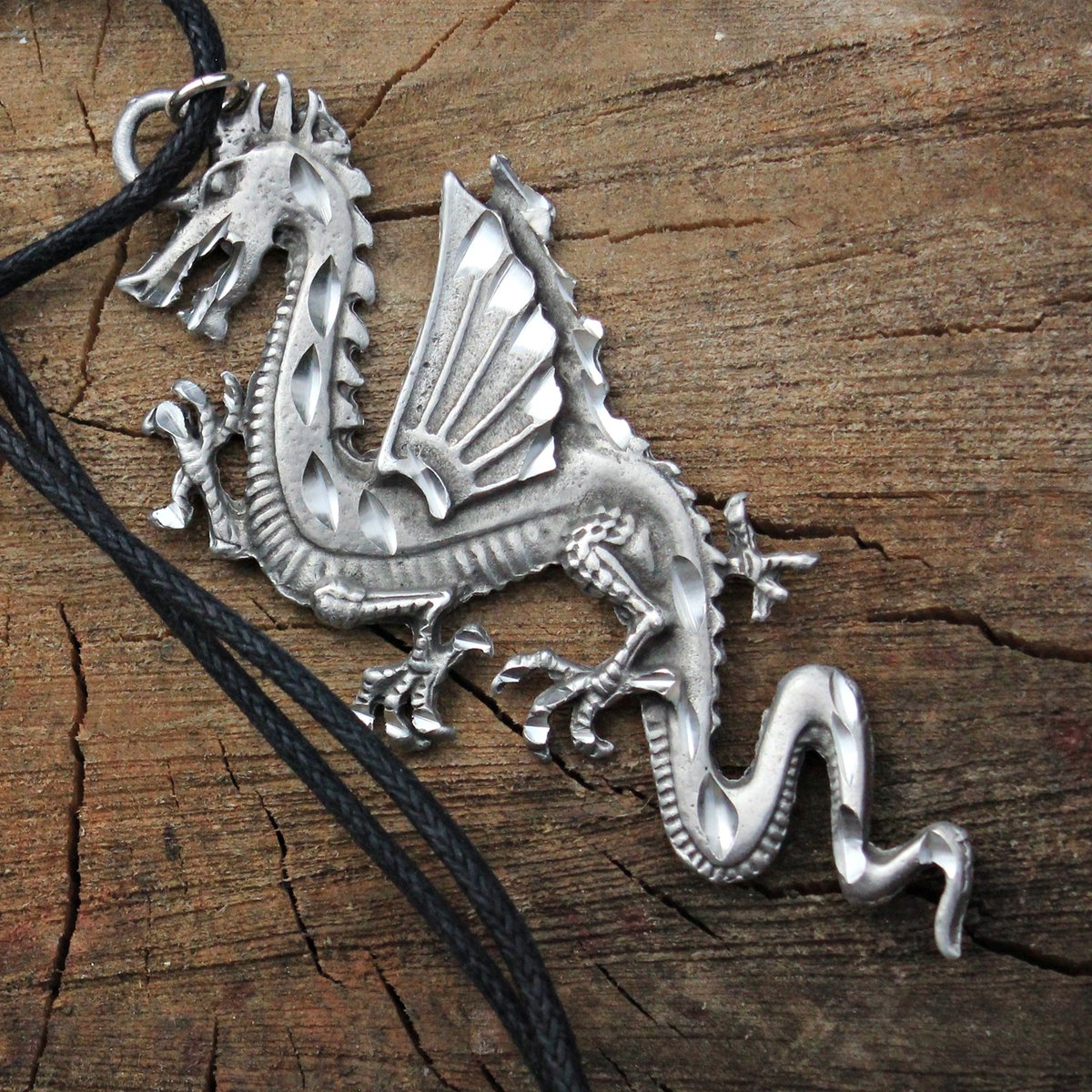 Mystical diamond cut pewter dragon necklace with black cord. A perfect gift for men or women.  
etsy.me/2rFkrIT 
#jewelleryformen
#MHHSBD