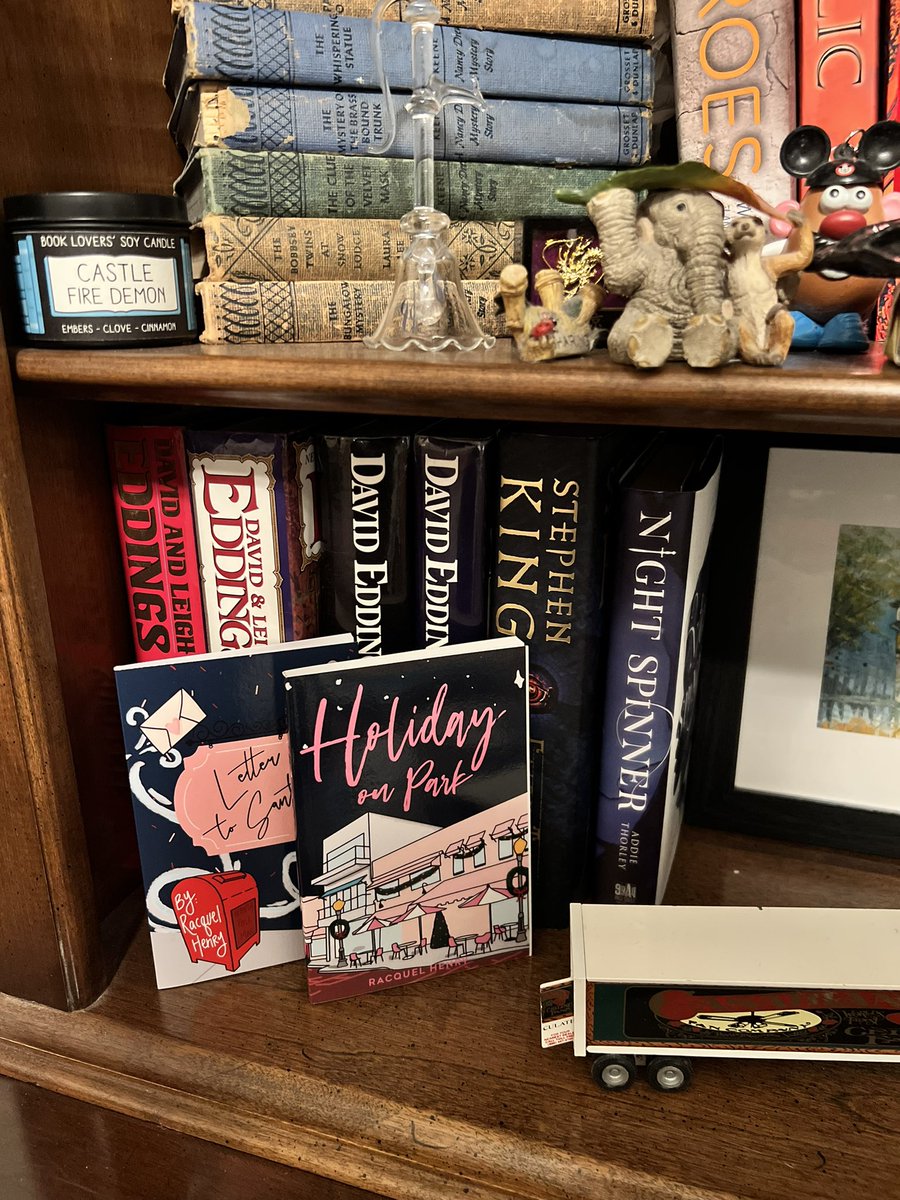 Got <a href="/RacquelHenry/">Racquel Henry</a>’s books Front and center on my shelf! (Note that Christmas in Cardwick is missing because my teen daughter absconded with it to her own room lol) #amreading #romance