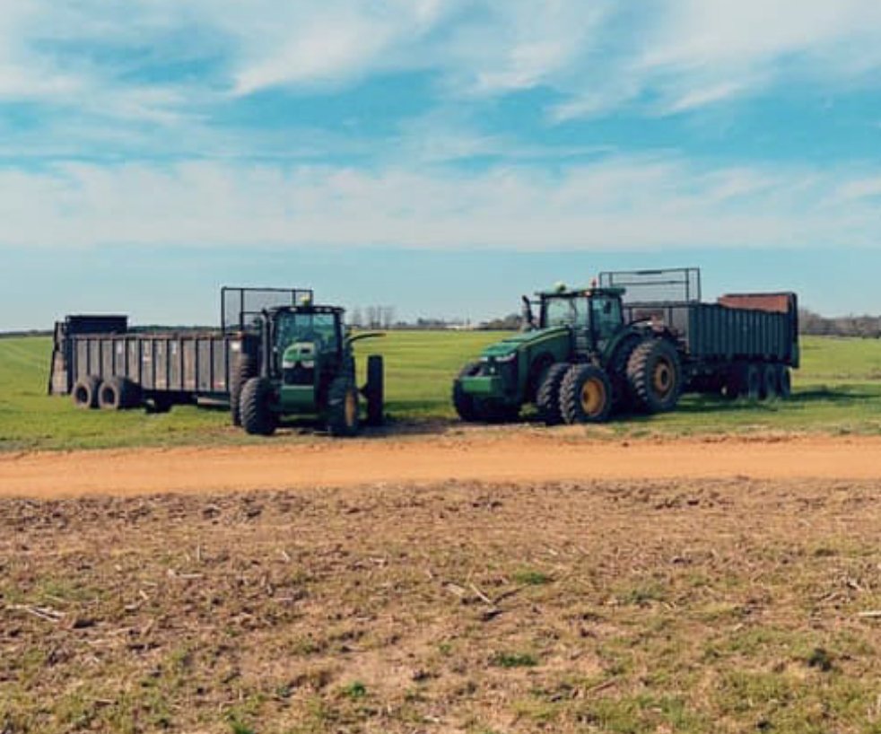 Two Artex spreaders, working in that red Georgia clay. #ArtexStrong