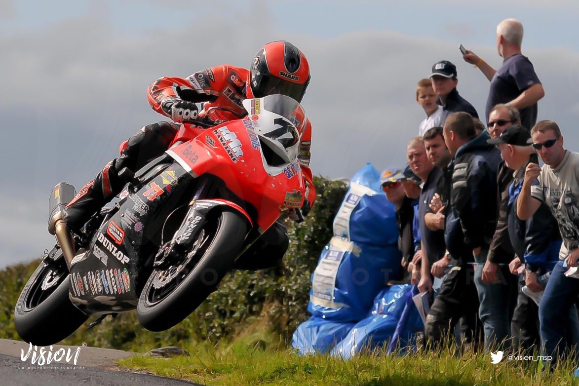 A throwback to the first ever Armoy Road Race – Race of Legends which was run in July 2009.  @ryanfarquhar77 flying, literally - past the fans and a line of photographers.  Have enjoyed looking back through the old hard drives.  Good memories

#roadracing @ArmoyRoadRaces #armoy