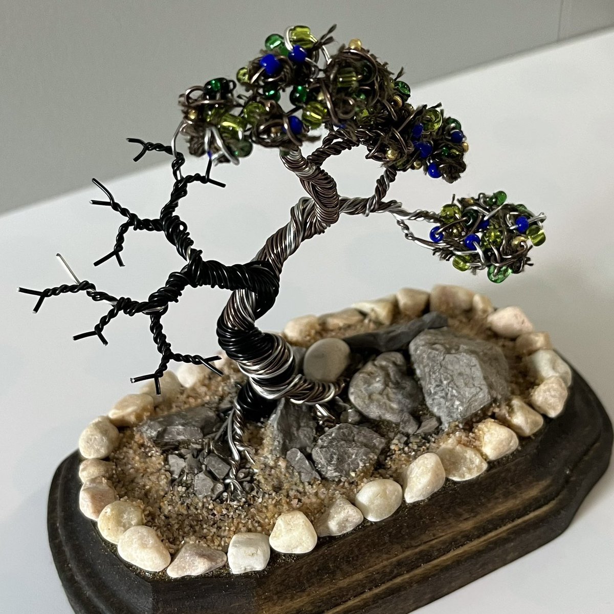 Semi-Cascade Wire Bonsai with Deadwood.
•
Base is 5x3.25in Tall
Tree Stands 4.75in Tall
•
#wire #wireart #wirewrapping #wiretree #wirebonsai #wirebonsaitree #bonsai #bonsaitree #wiresculpture #sculpture #3dart #cascade #semicascade #cascadebonsai #art #artist #deadwood #jin