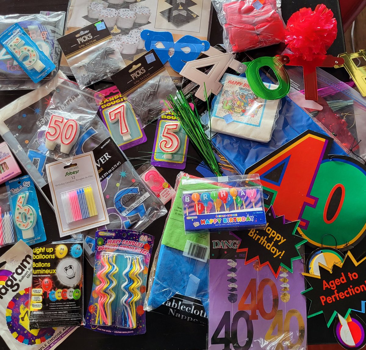 Okay fullstop - must know, who is our ~!?secret admirer?!~ that dropped off a milk crate full o' party supplies to Dart and @frostingcakesandevents this morning.

Look at all these party supplies! I am curious and enthralled. Reveal yourself, kind friend! 😅 🥳 🎉 🪅 🎊🎈