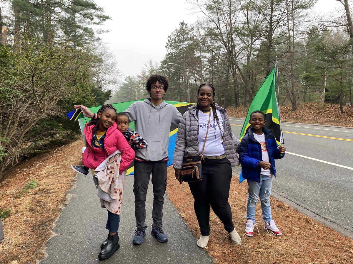 Mary Chomba (2nd to right) who came to the 20km mark to cheer on Tanzanian runner Gabriel Geay is celebrating his 2nd place win in the men’s elite division in the 2023 Boston Marathon. She showed up with her sons and family friends.