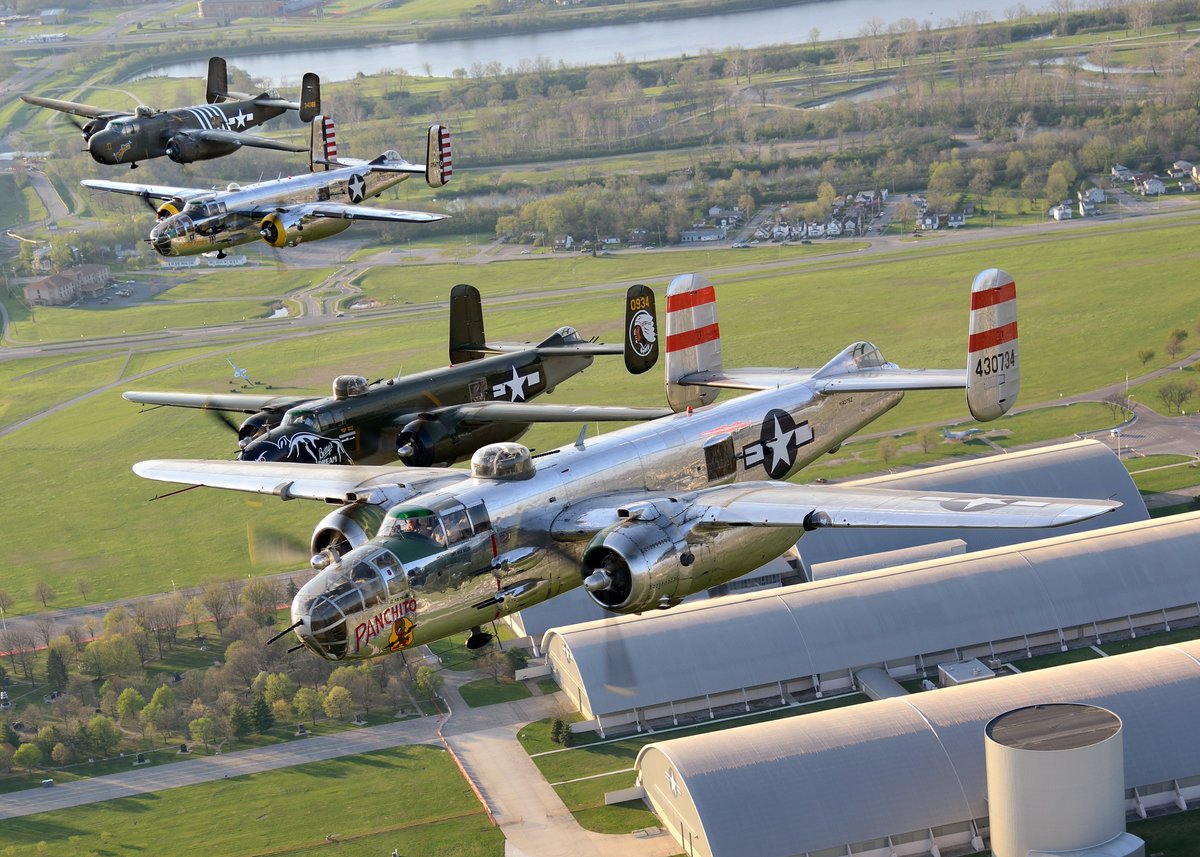 AFmuseum's tweet image. Check out these photos from April 2017 as four B-25 Mitchell bombers fly over @AFmuseum as part of the 75th Anniversary of the Doolittle Tokyo Raid. The aircraft pictured here are Panchito, Betty's Dream, God and Country, and Barbie III. Photo by Greg Morehead @WarbirdNews
