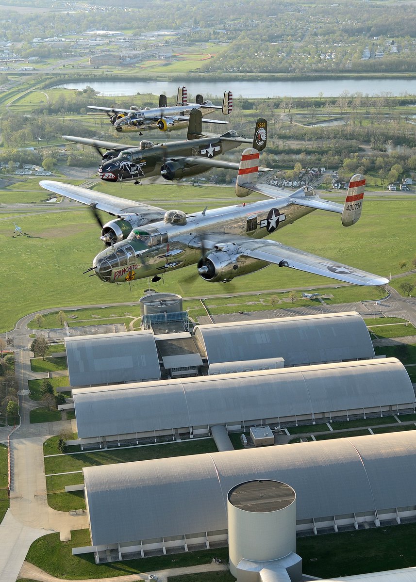 AFmuseum's tweet image. Check out these photos from April 2017 as four B-25 Mitchell bombers fly over @AFmuseum as part of the 75th Anniversary of the Doolittle Tokyo Raid. The aircraft pictured here are Panchito, Betty's Dream, God and Country, and Barbie III. Photo by Greg Morehead @WarbirdNews