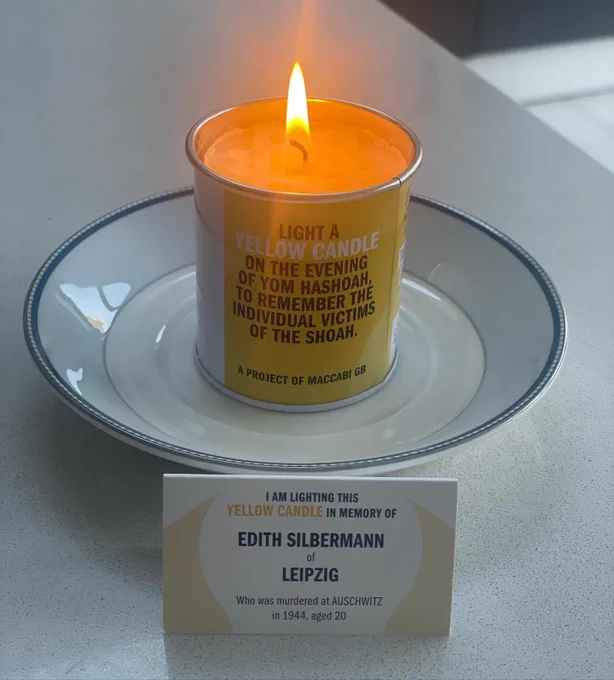 Lit candle for Edith Silbermann, murdered in 1944, aged 20