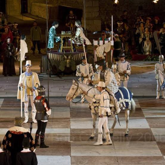 Marostica game of chess! Dating back to 1454, this historic tradition sees competitors vying for the hand of a lord's daughter through a life-size game of chess.
Held every 2 years in September, the event is a stunning display of skill, strategy, & costumes.
#chesshistory