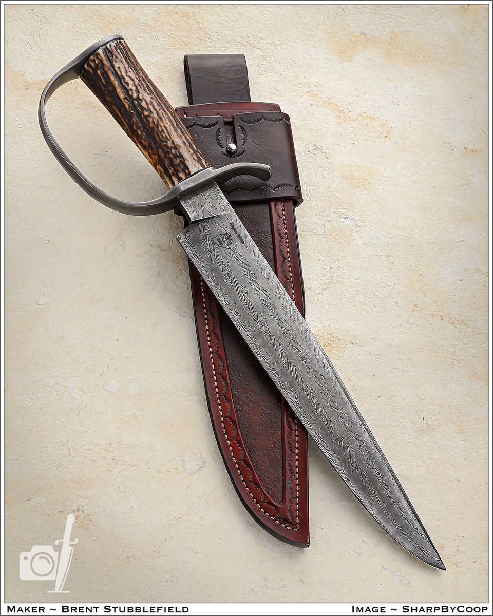 Brett <a href="/JoinOrDieKnives/">Join Or Die Knives</a> commemorates the return of Elk Hunting in Virginia with this tribute D-guard bowie.

That's 12" BL / 16" OAL of 4-bar Turkish twist, a LOT of authentic wrought iron, and a comfortable Elk handle.

He also made that paneled sheath. Whew! Follow him.