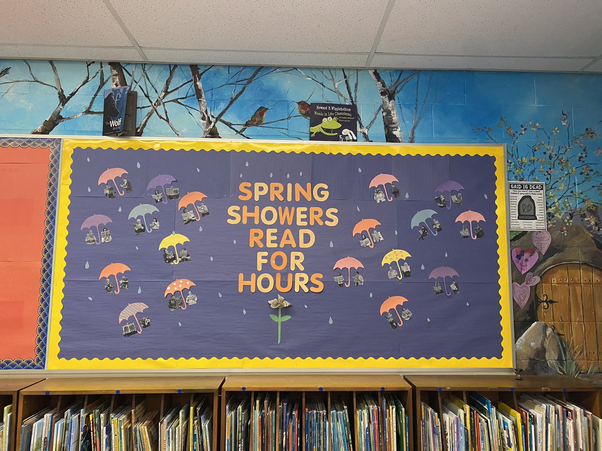 Printed pictures of the staff and put them under the umbrellas! #SchoolLibraryjoy #schoollibrary #librarylove