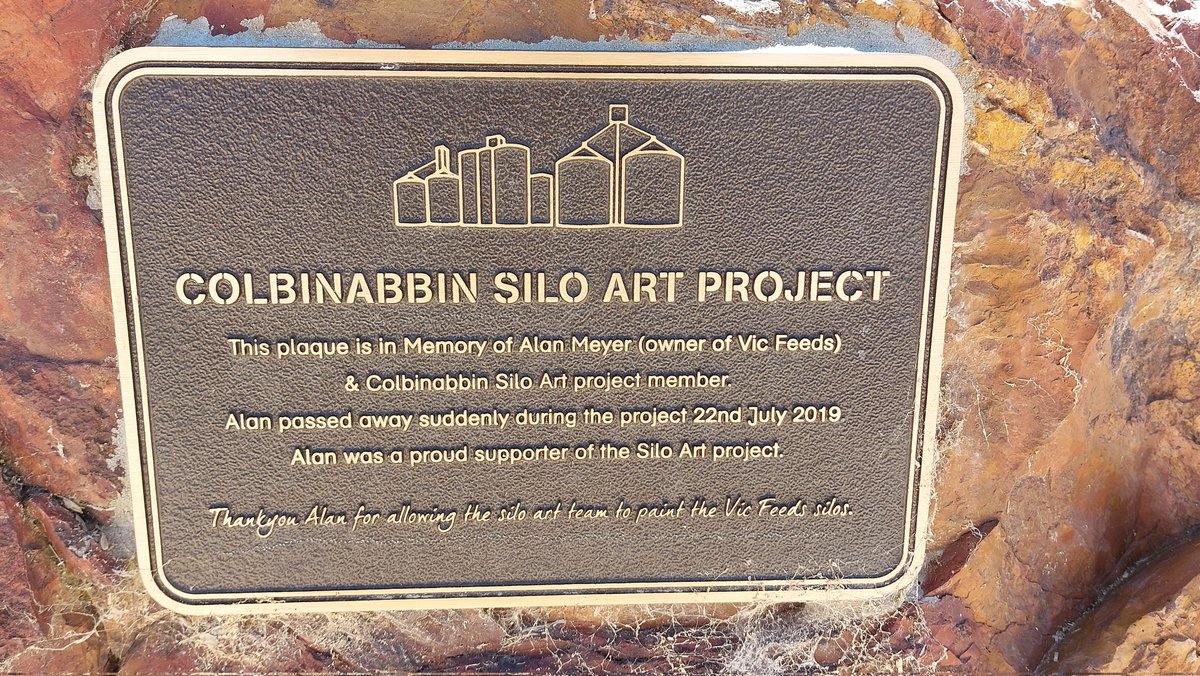 pfwaus's tweet photo. Memorial plaque commemorating Alan Meyer for his support of the #SiloArt project on the #VicFeeds storage silos at #Colbinabbin #Victoria #Australia #Travel #TravelOz #StreetArt #art https://t.co/q7Mkkeekmy