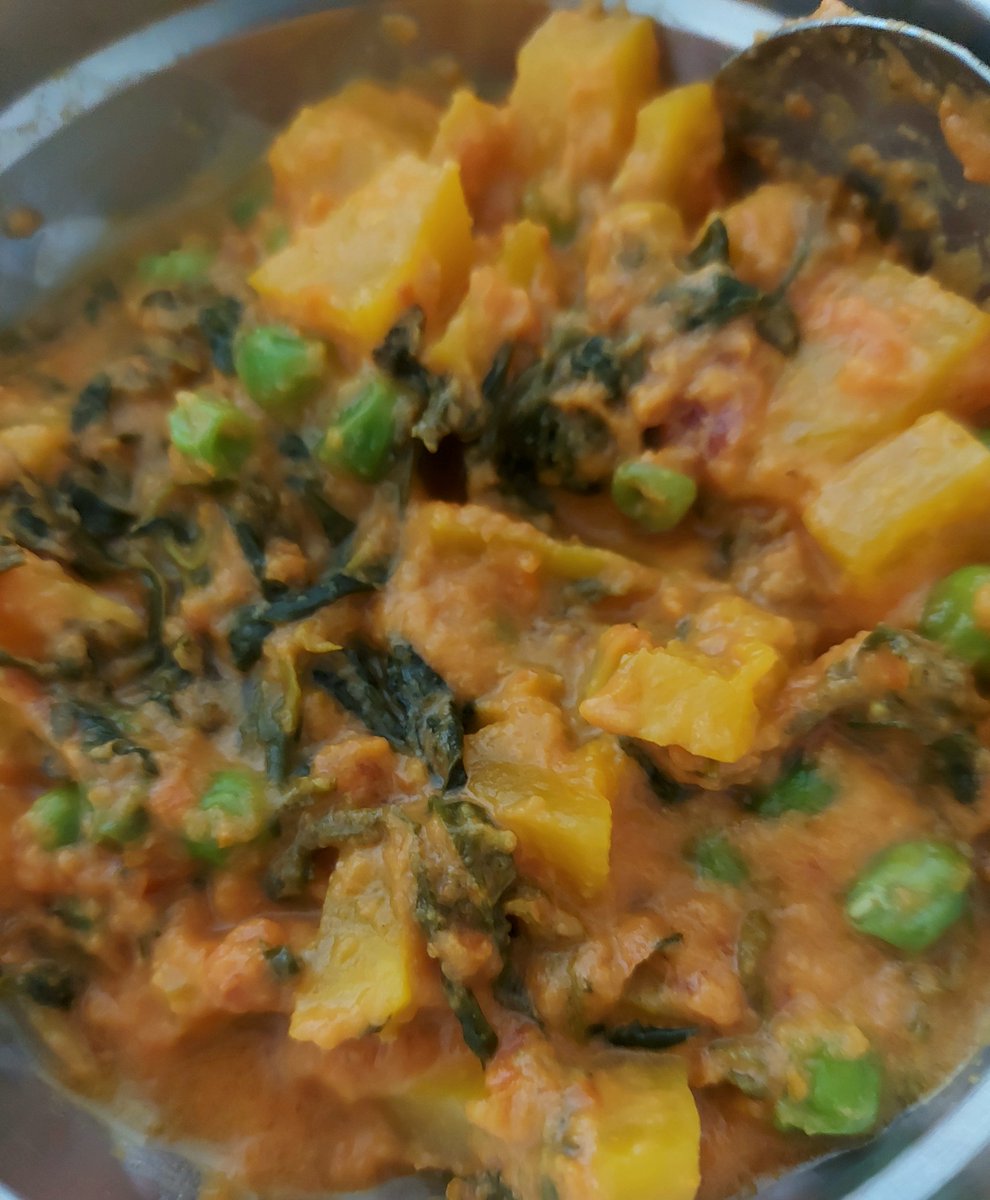 Pumpkin, methi cooked in tomato puree and coconut milk with a dash of peas. #LunchBreak