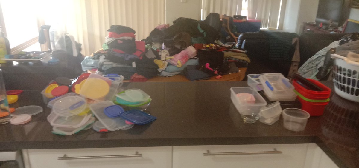 Lids, containers and unsorted laundry.