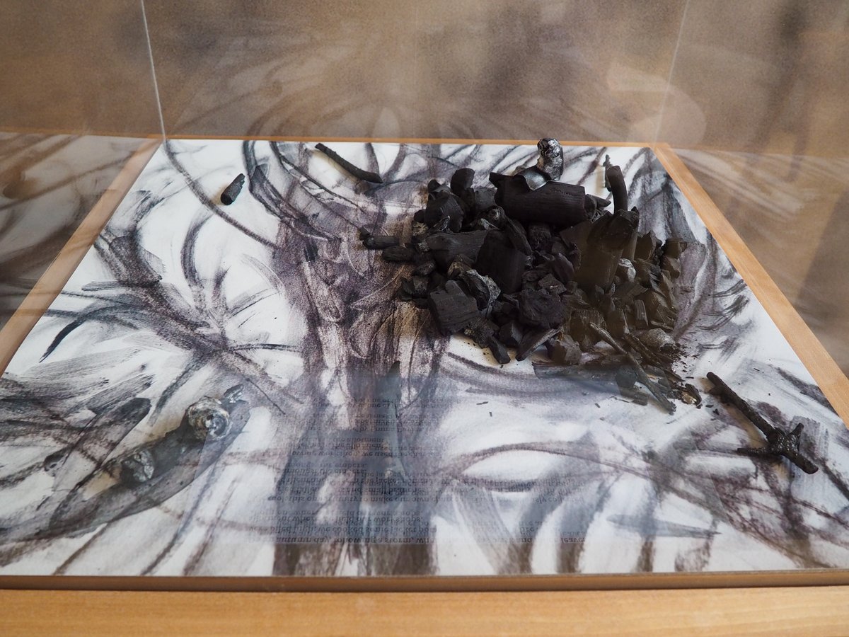 JusticeMuseum's tweet image. The charcoal sculpture in our #ProjectLab is named ‘Homage’ and was created by Emma Davies. 

The charcoal was made by participants to the bonfire at the allotment where the workshops were held. The sculpture sits upon a copy of one of the tree portraits drawn using the charcoal.