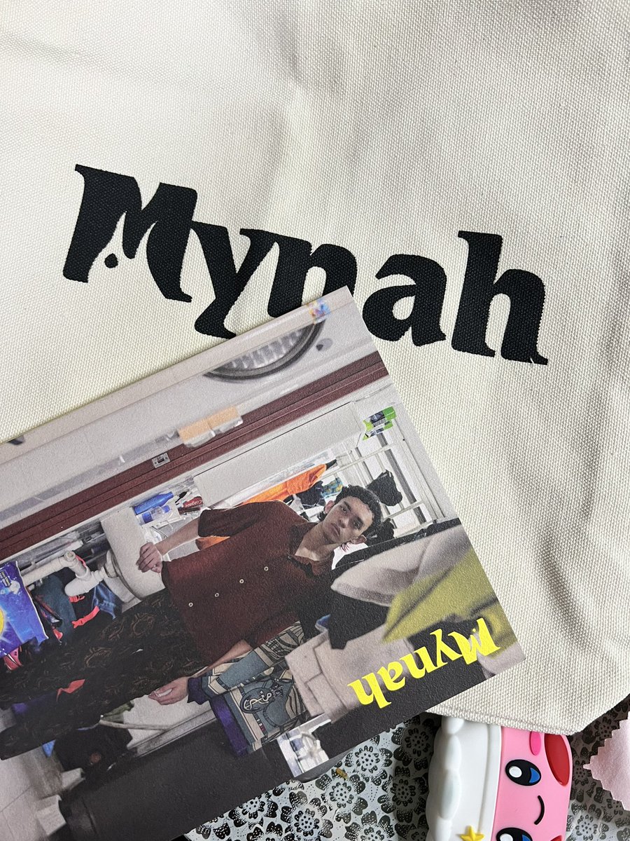 My <a href="/mynahmag/">Mynah Magazine</a> tote and issue are here!! Also peep my Kirby airpod case
