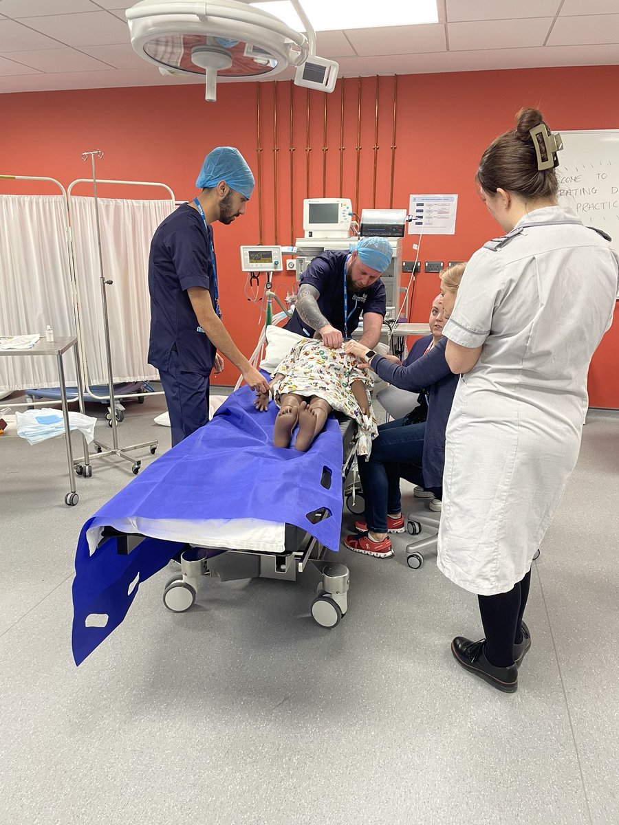 RuthStow's tweet photo. Getting prepped in theatre. Continued collaboration between ODP and CYP Nursing #covipe @CU_HLS https://t.co/cztCfVVBQW