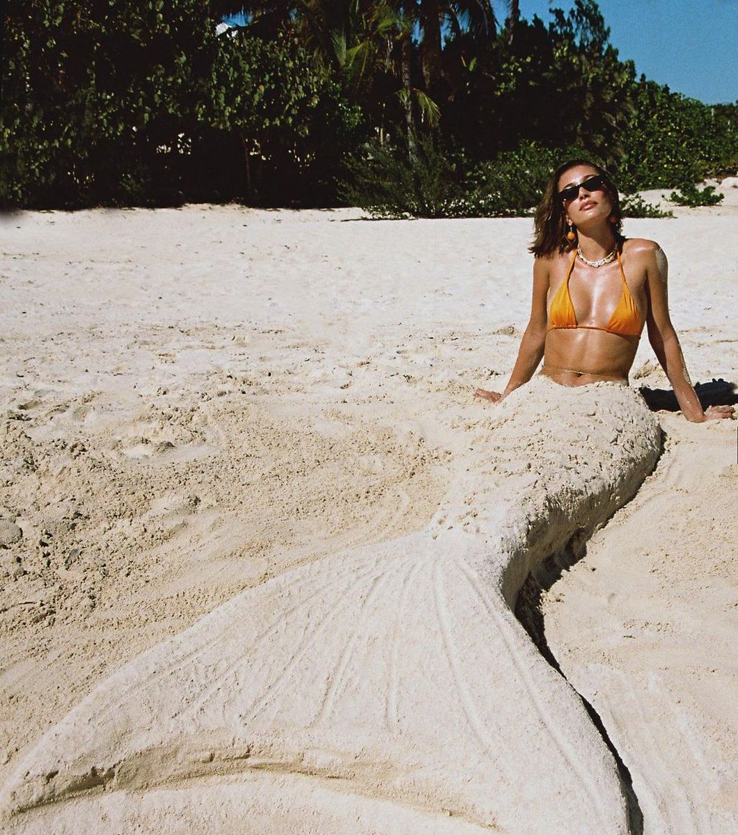 Hailey ups the heat in an orange bikini and mermaid tail 🧡🧜‍♀️

#HaileyBeiber #BeachLife #Hollywood #SummerReady