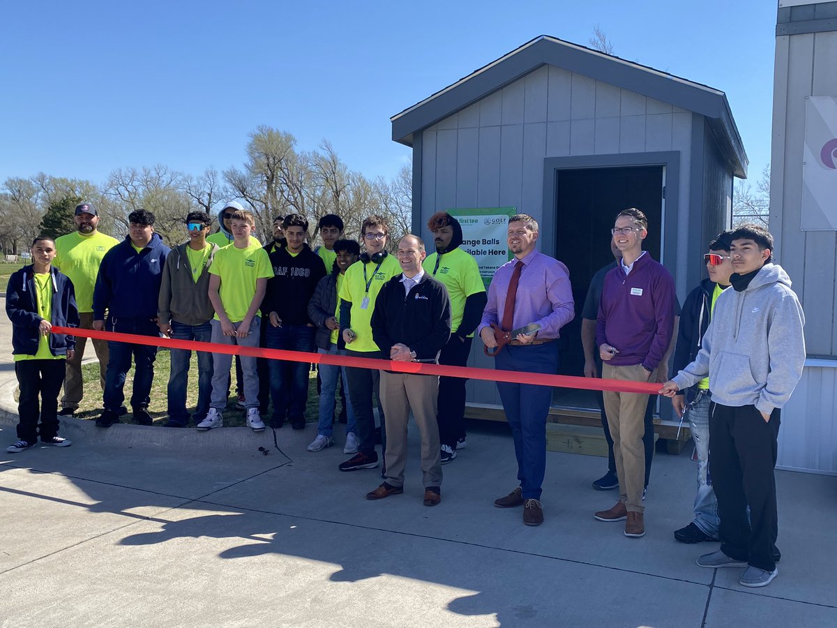 Aaron Haselwood's Blue Aces Construction advanced carpentry classes at East High built a ball dispenser shed for First Tee Greater Wichita. A ribbon cutting for the shed was held today during the mayor’s briefing <a href="/EastHighAces/">East High Aces</a> <a href="/FirstTeeWichita/">First Tee Greater Wichita</a> <a href="/WPS_CTE_CCR/">WPSCollegeCareerReady</a>