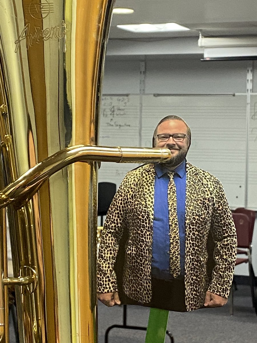 Mr. Curtis was testing his chops during instrument try-outs. Is playing the baritone just like riding a bike, Mr. C? #1gc #apweek23 ⁦@GIS_AsstPrin⁩