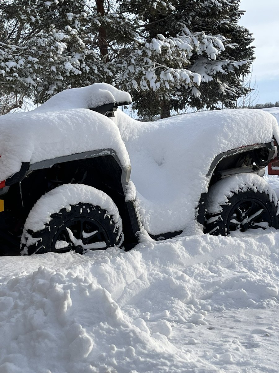 SarahHorsegirl's tweet photo. Our fourwheeler’s are covered in snow #AprilSnowStorm https://t.co/R84R3oaow8