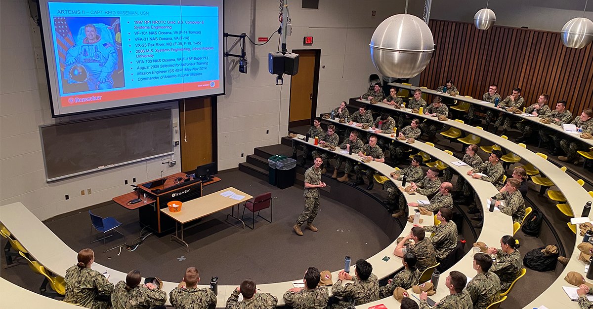 rpi's tweet photo. Midshipmen from our Naval Reserve Officers’ Training Corps program learn about and are inspired by astronaut Reid Wiseman ’97! https://t.co/ap7GvuEToF
